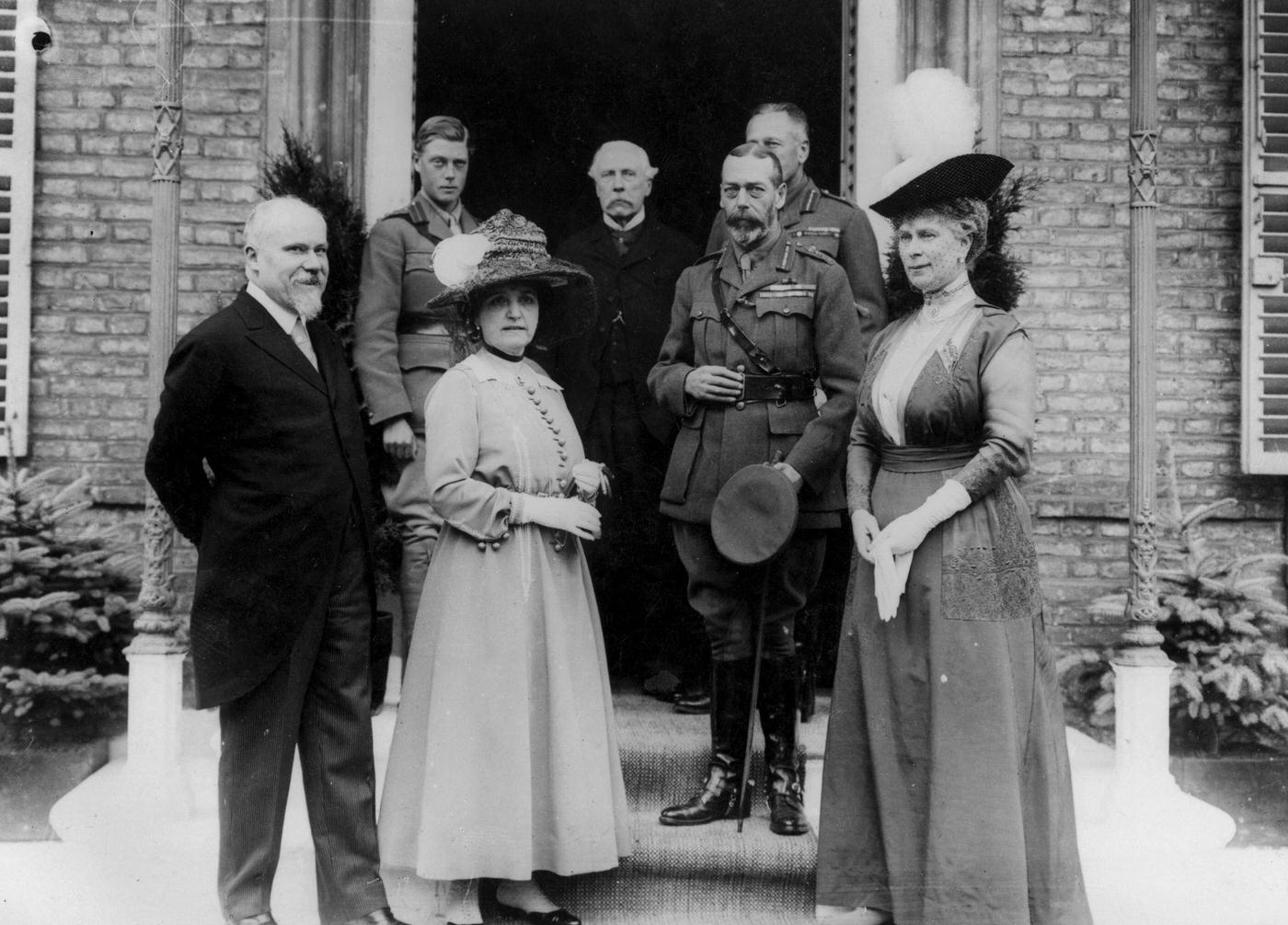 On the far right is Queen Mary and on her right King George V. Edward the Prince of Wales their elder son, is on the left in the doorway and like his father is in army uniform.