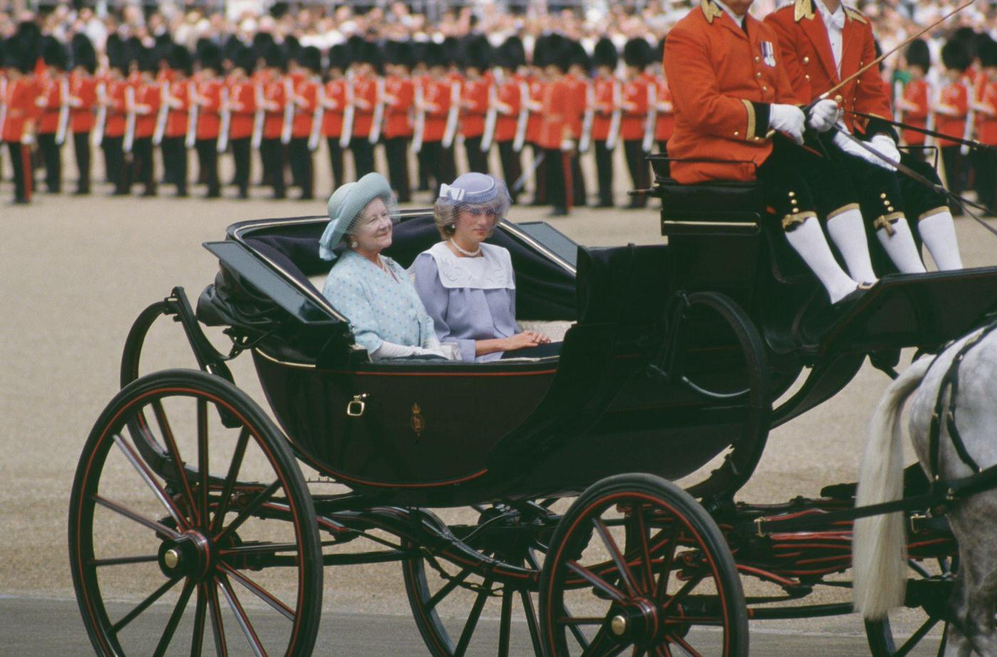 The Queen Mother and Diana, Princess of Wales, in a carriage outside Buckingham Palace in London during the Trooping the Colour ceremony, 1984.