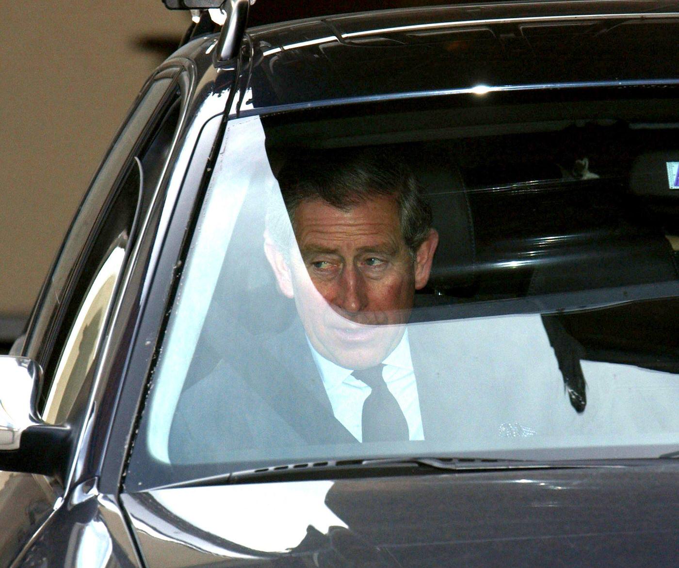 Prince Charles on his way to Windsor following the death of the Queen Mother, Klosters, 2002