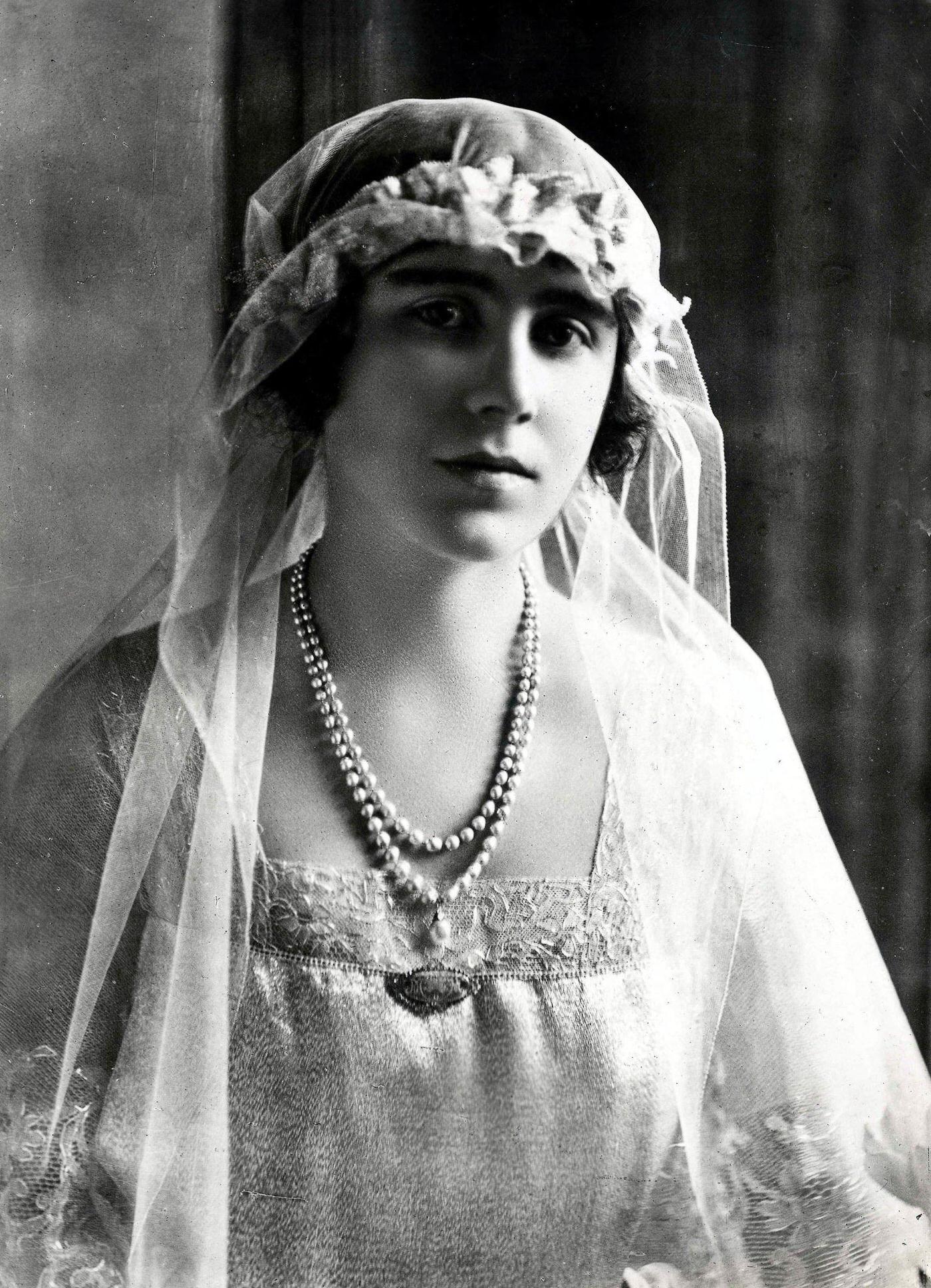 The Queen Mother pictured as a bridesmaid for the wedding of the Princess Royal when she was the Duchess of York, 1922.