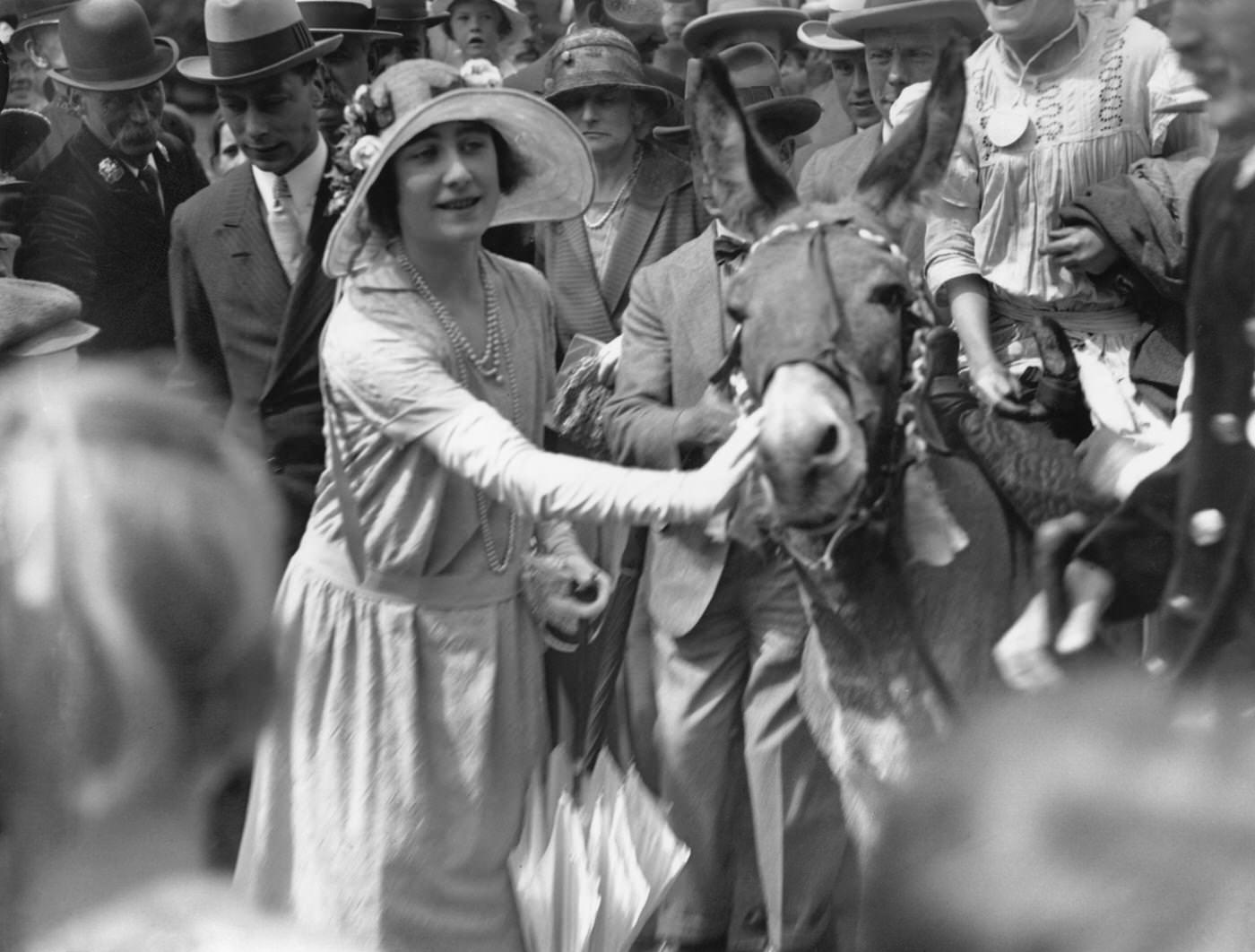 The Duke (left) and Duchess of York at a 'Fresh Air Fund Outing' at Loughton, Essex, July 1923.