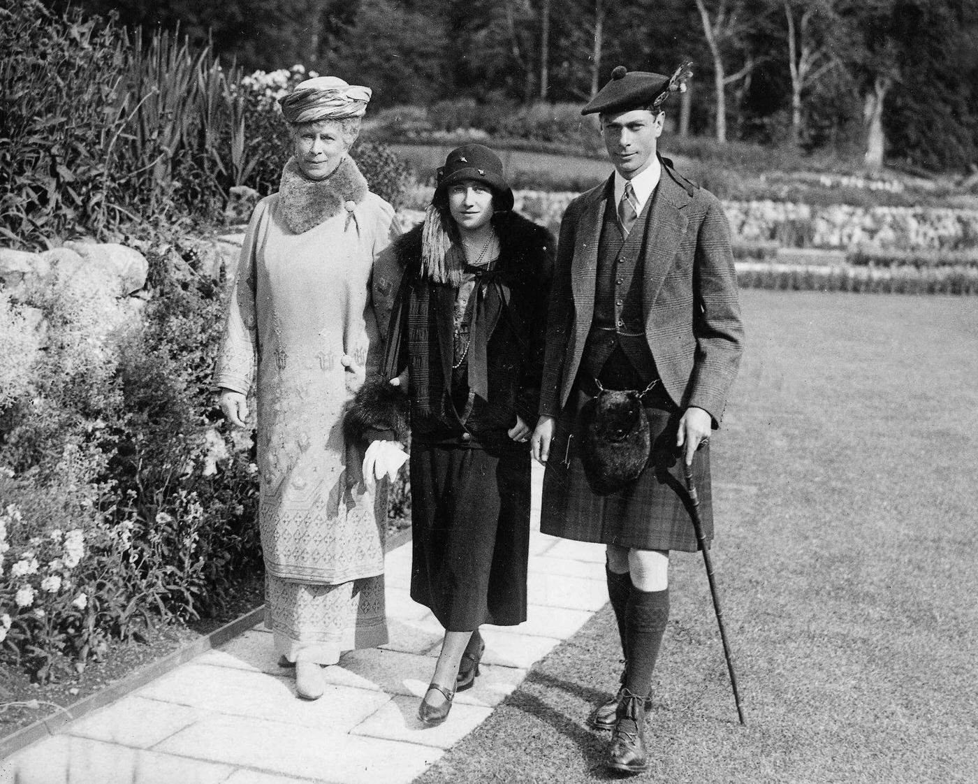 Queen Elizabeth when she was the Duchess of York with her husband the Duke of York in the gardens at Balmoral Castle, Scotland.
