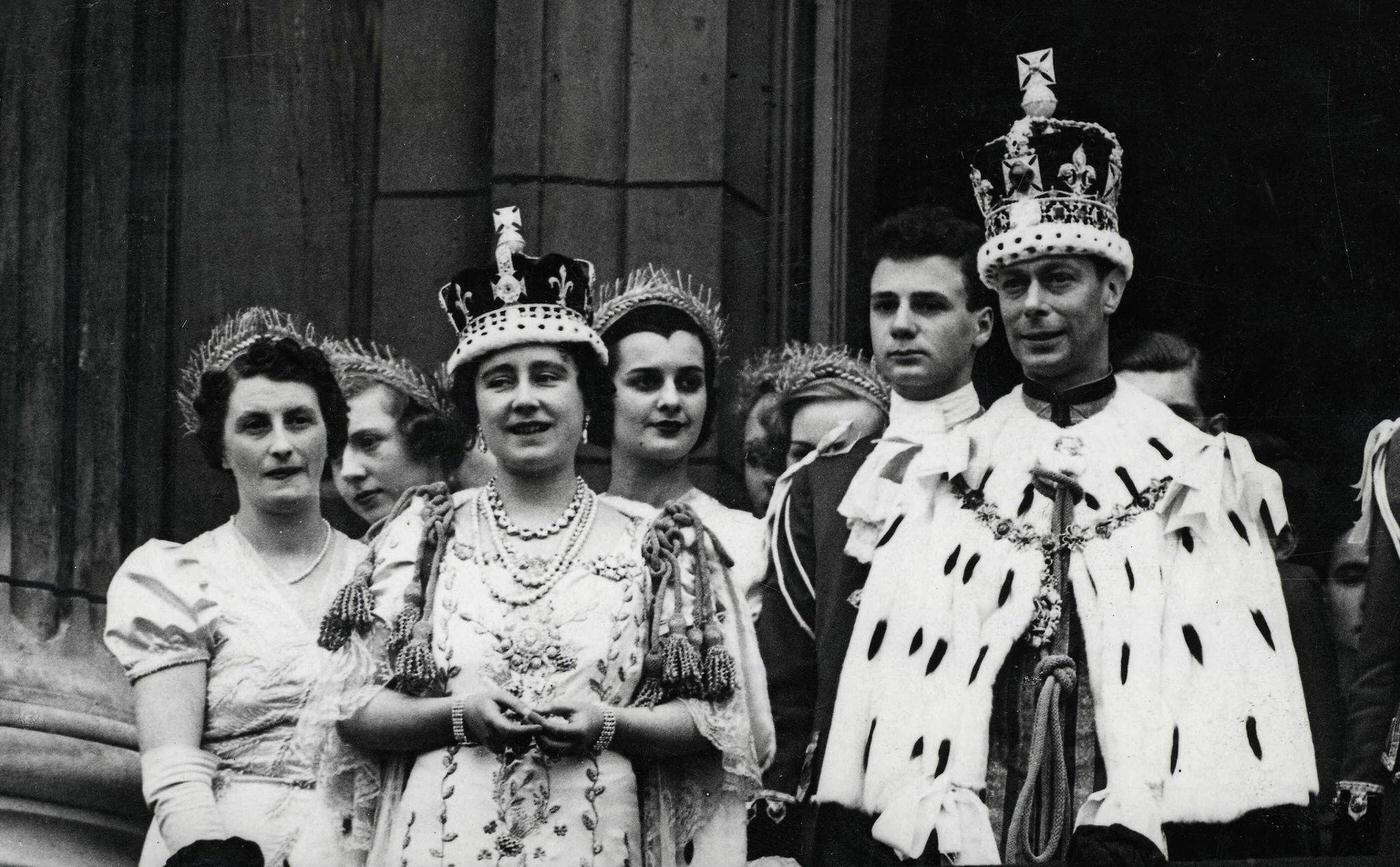 King George VI and Queen Elizabeth on the balcony of Buckingham Palace after their coronation, London, 1937.