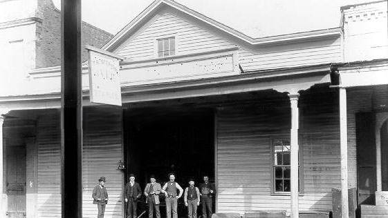 Group in Front of T.R. Stephens Stable, 1895