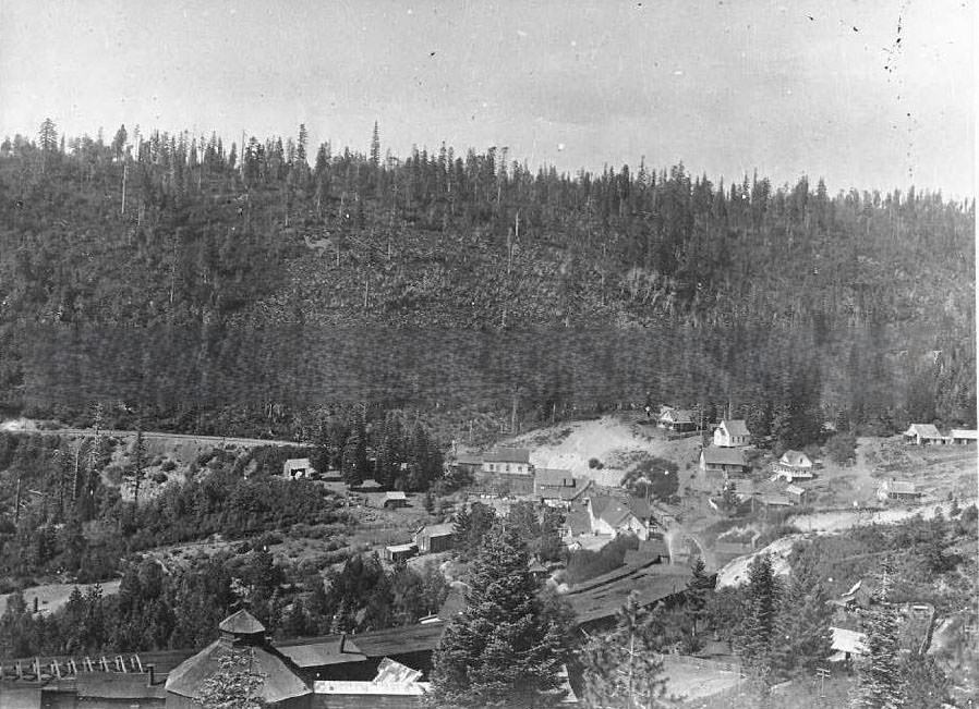 Mountain town with railroad snow sheds, 1890