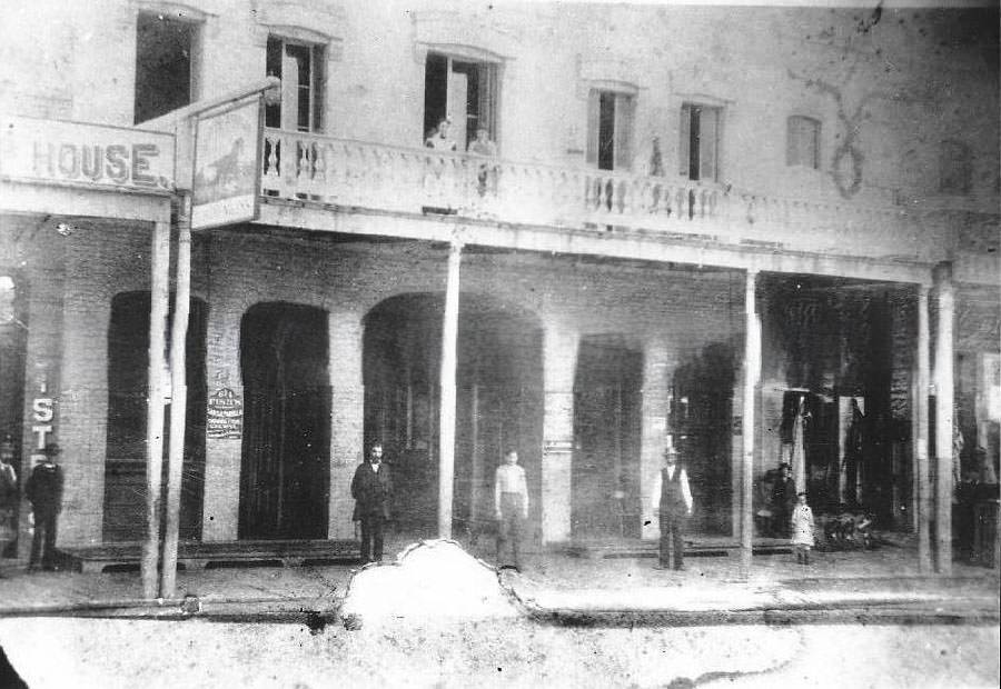 Sacramento Street scene with storefronts, 1890