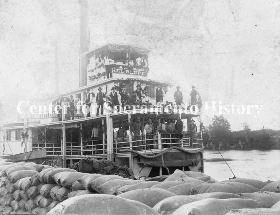 Steamship Red Bluff, bags of grain in foreground, 1890