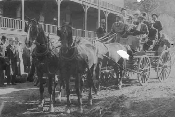 People riding in wagon, 1890