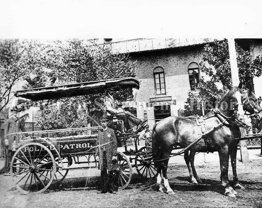 Patrol Wagon, 1895. This horse-drawn wagon was the police department's first vehicle. Dubbed the 'Black Maria', it served as prisoner transport and ambulance.