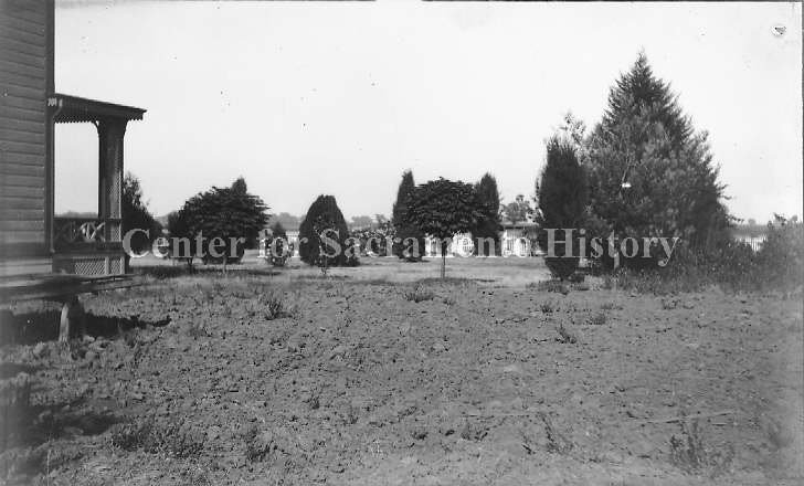 View of plowed ground on side of McFarland house, 1895