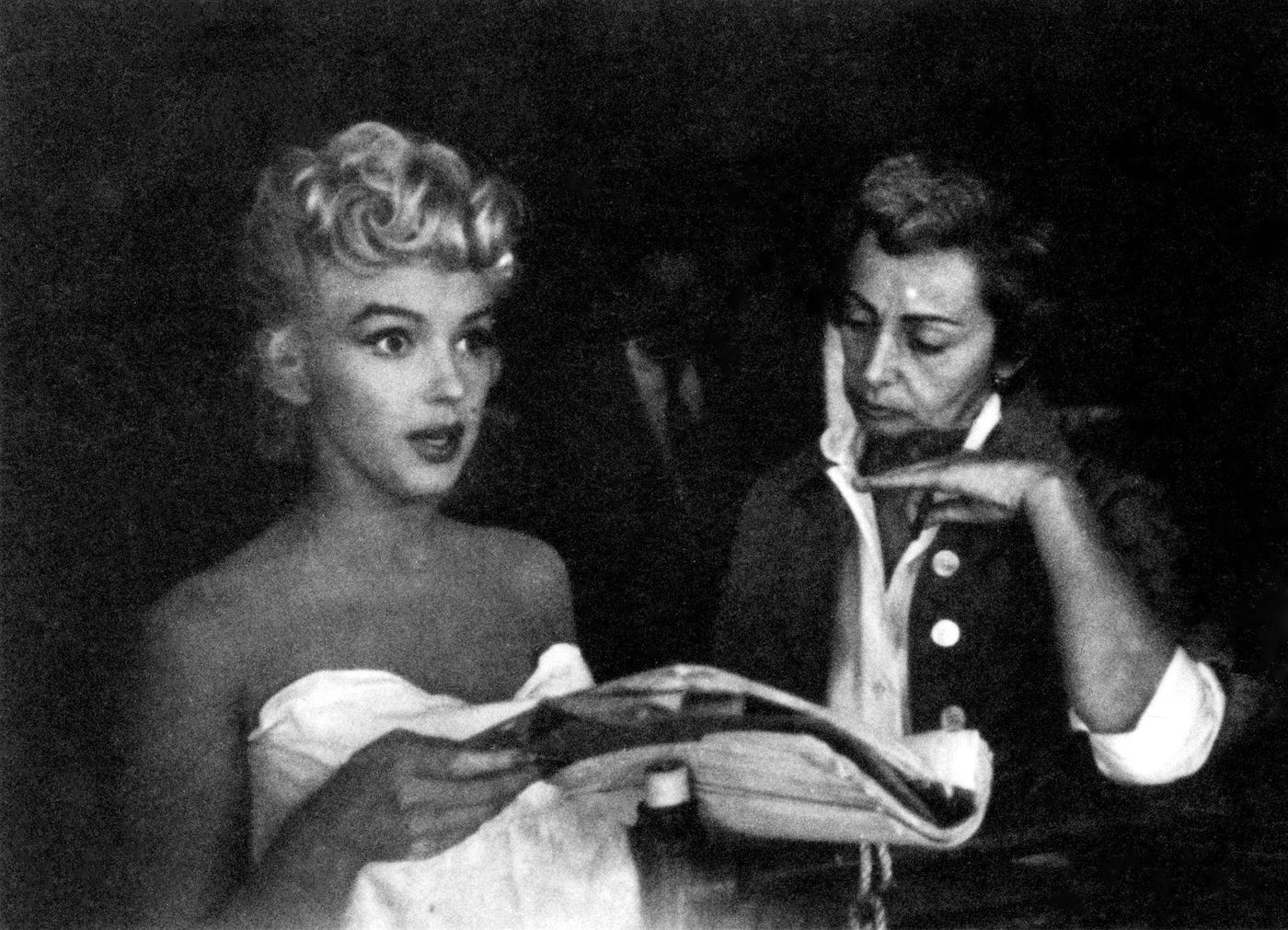 Marilyn Monroe prepares for a bathtub scene with Columbia Pictures drama coach Natasha Lytess in 1954 during the filming of "The Seven Year Itch"