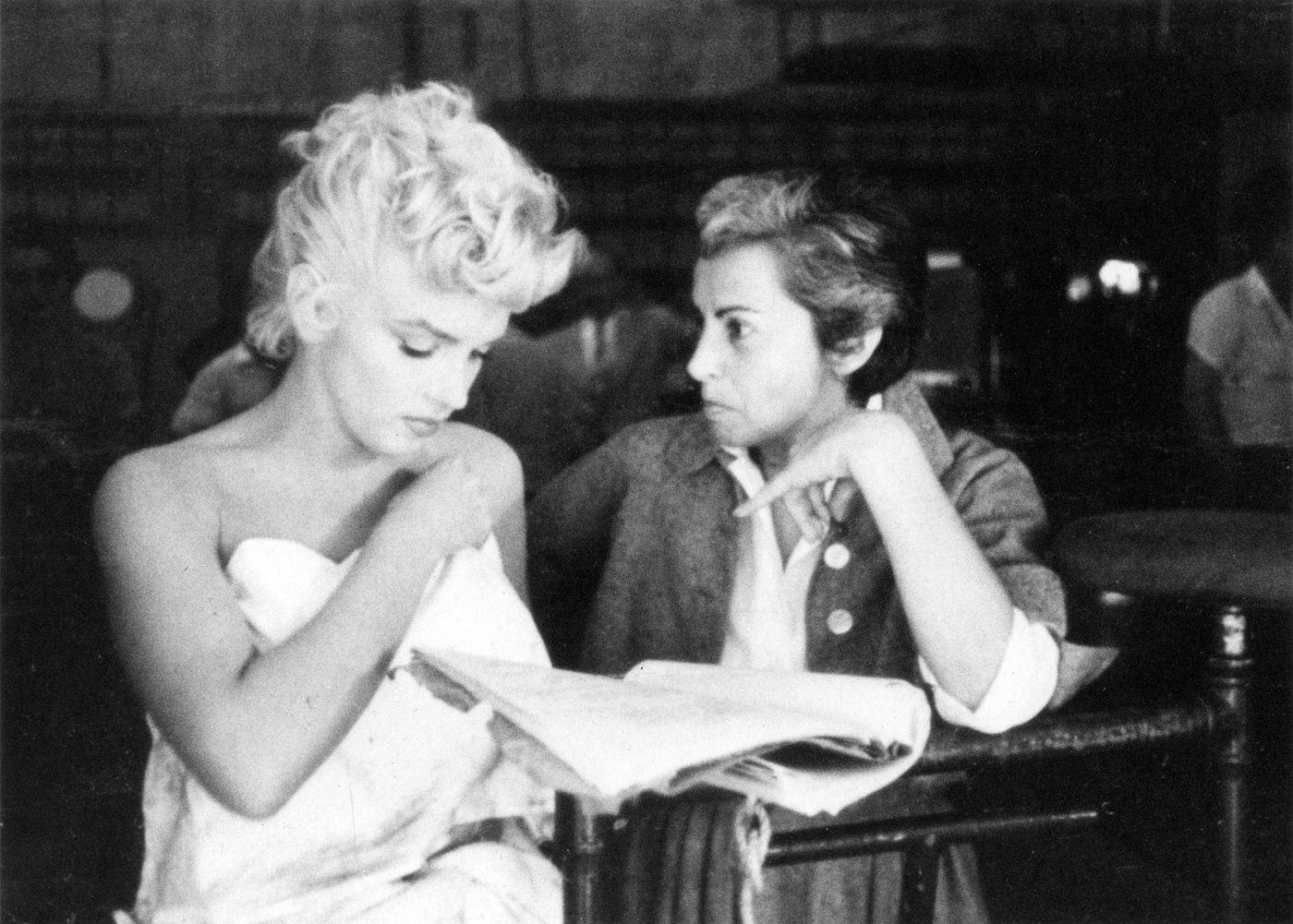 Marilyn Monroe prepares for a bathtub scene with Columbia Pictures drama coach Natasha Lytess in 1954 during the filming of "The Seven Year Itch"