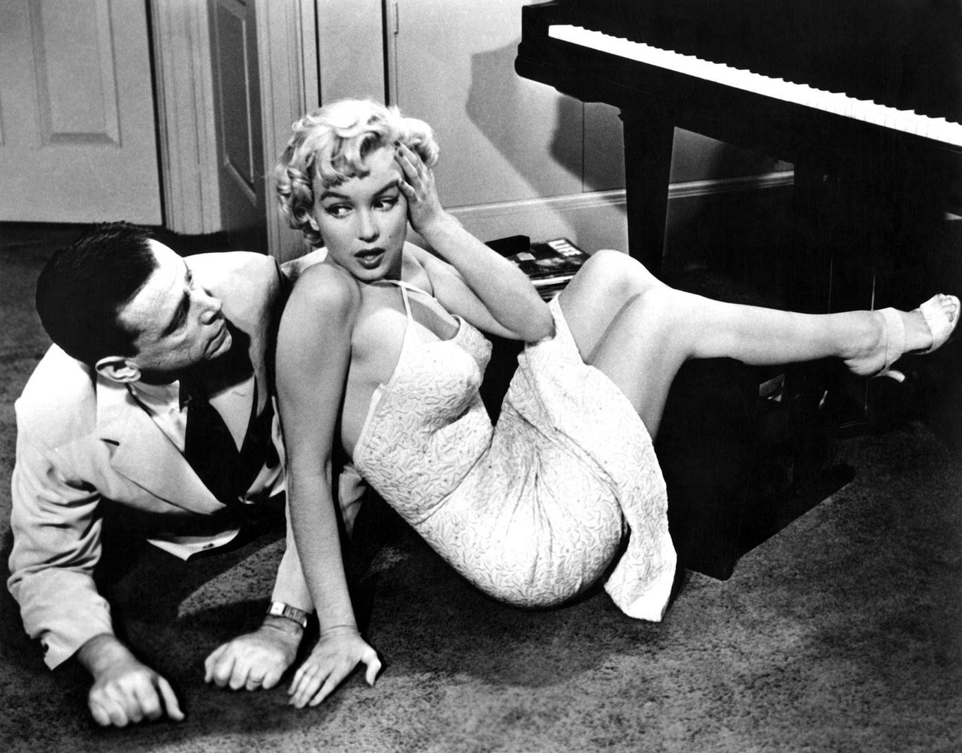 Marilyn Monroe with co-star Tom Ewell in 1954 during the filming of "The Seven Year Itch" in Los Angeles
