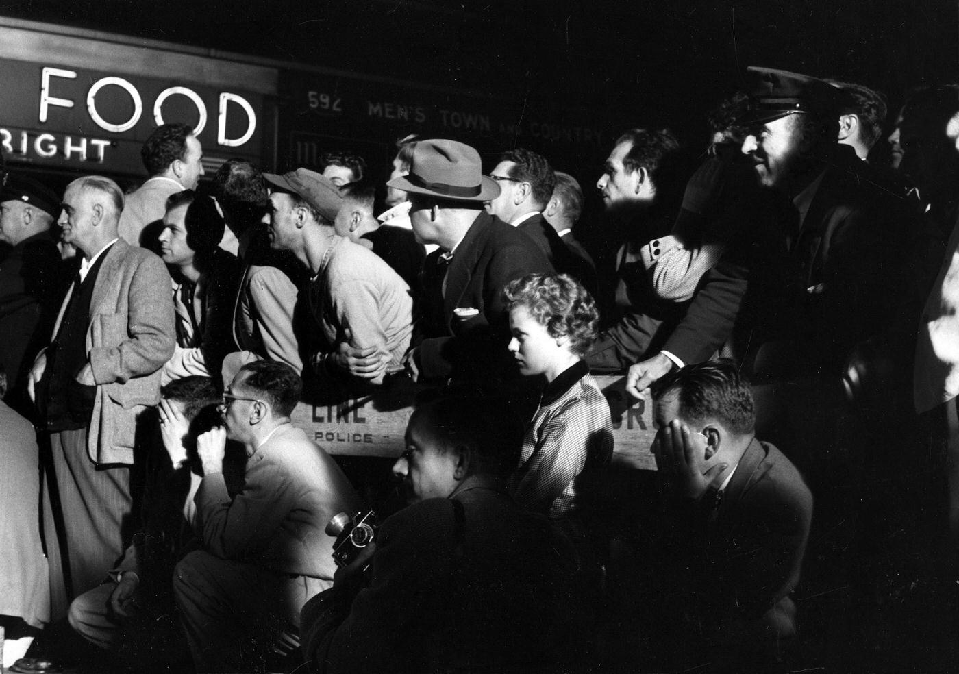 Crowd of onlookers at the corner of 51st Street and Lexington Avenue during the filming of the famous skirt-blowing scene for "The Seven Year Itch"