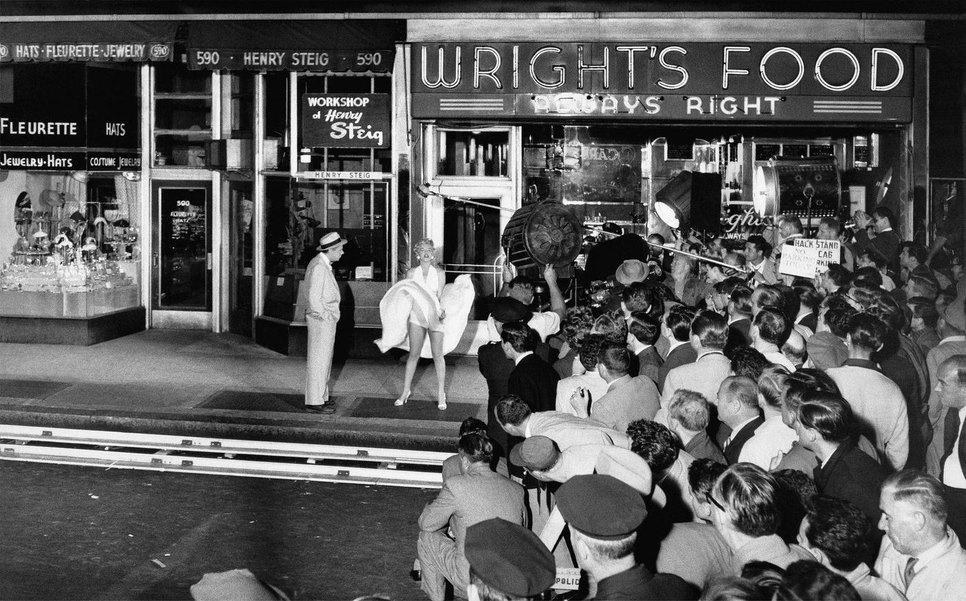 Marilyn Monroe portrays exhaustion in Idlewild Airport after a cross-country flight from Los Angeles.