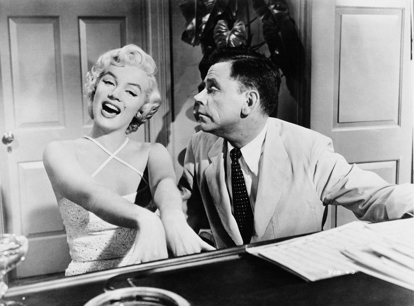 Marilyn Monroe and Tom Ewell on the set of 'The Seven Year Itch', 1955.