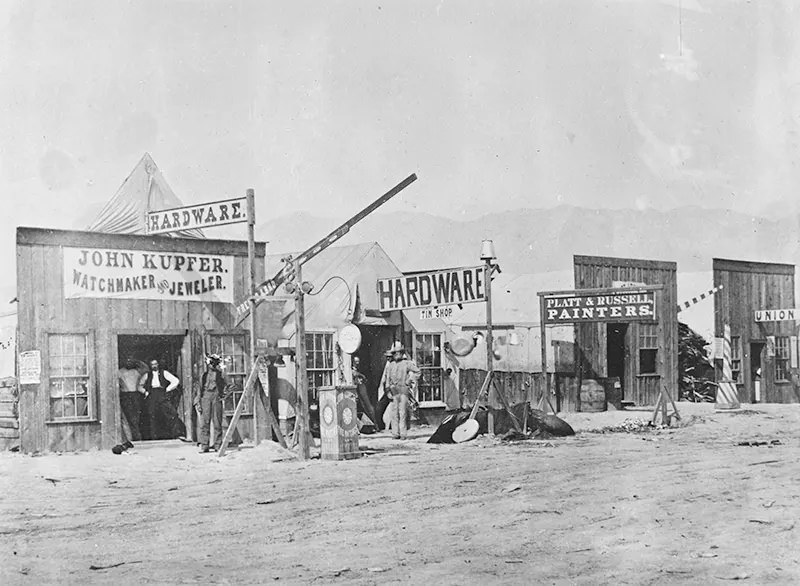 A street view in a typical American Frontier town, Corinne, Utah in 1869.
