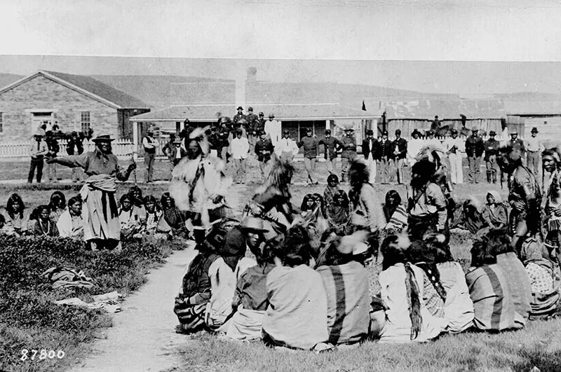Shoshone tribe members are shown dancing on a Native American reservation in Ft. Washakie, Wyoming in 1892.