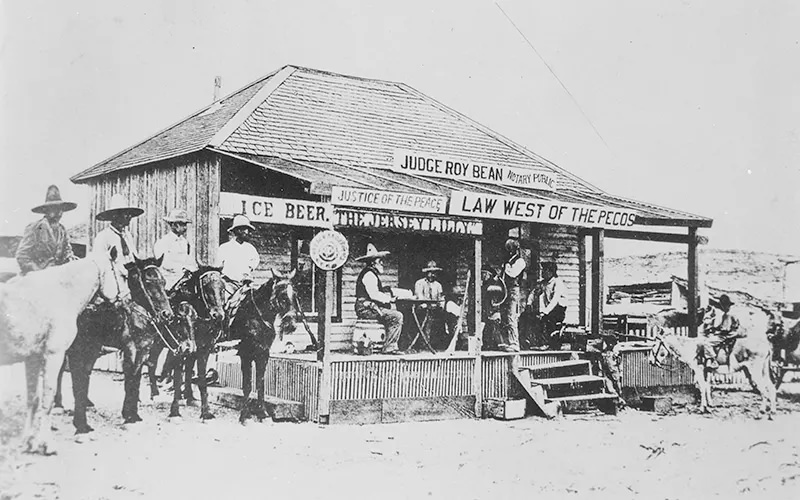 Judge Roy Bean’s notary office, which also served as a saloon, is captured in this photograph from Langtry, Texas in 1900.