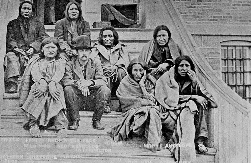 Cheyenne Indians, captured as they were trying to return to the Black Hills from a reservation in Oklahoma, are held prisoners in County Jail in Dodge City in 1878. This photograph was taken in 1913.
