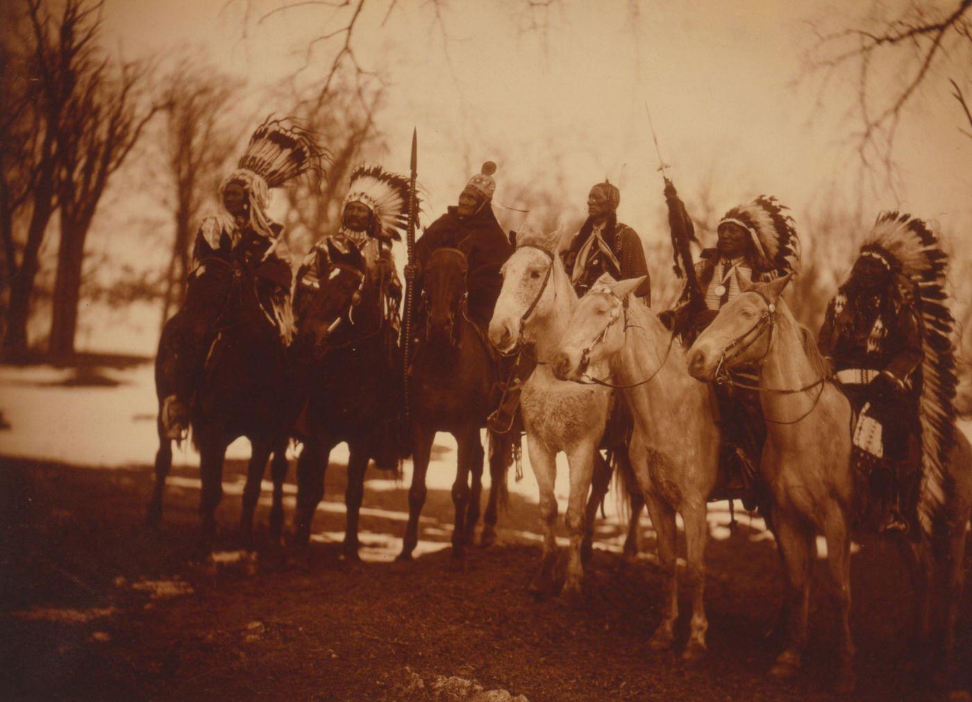 Six tribal leaders (l to r) Little Plume (Piegan), Buckskin Charley (Ute), Geronimo (Chiricahua Apache), Quanah Parker (Comanche), Hollow Horn Bear, 1900