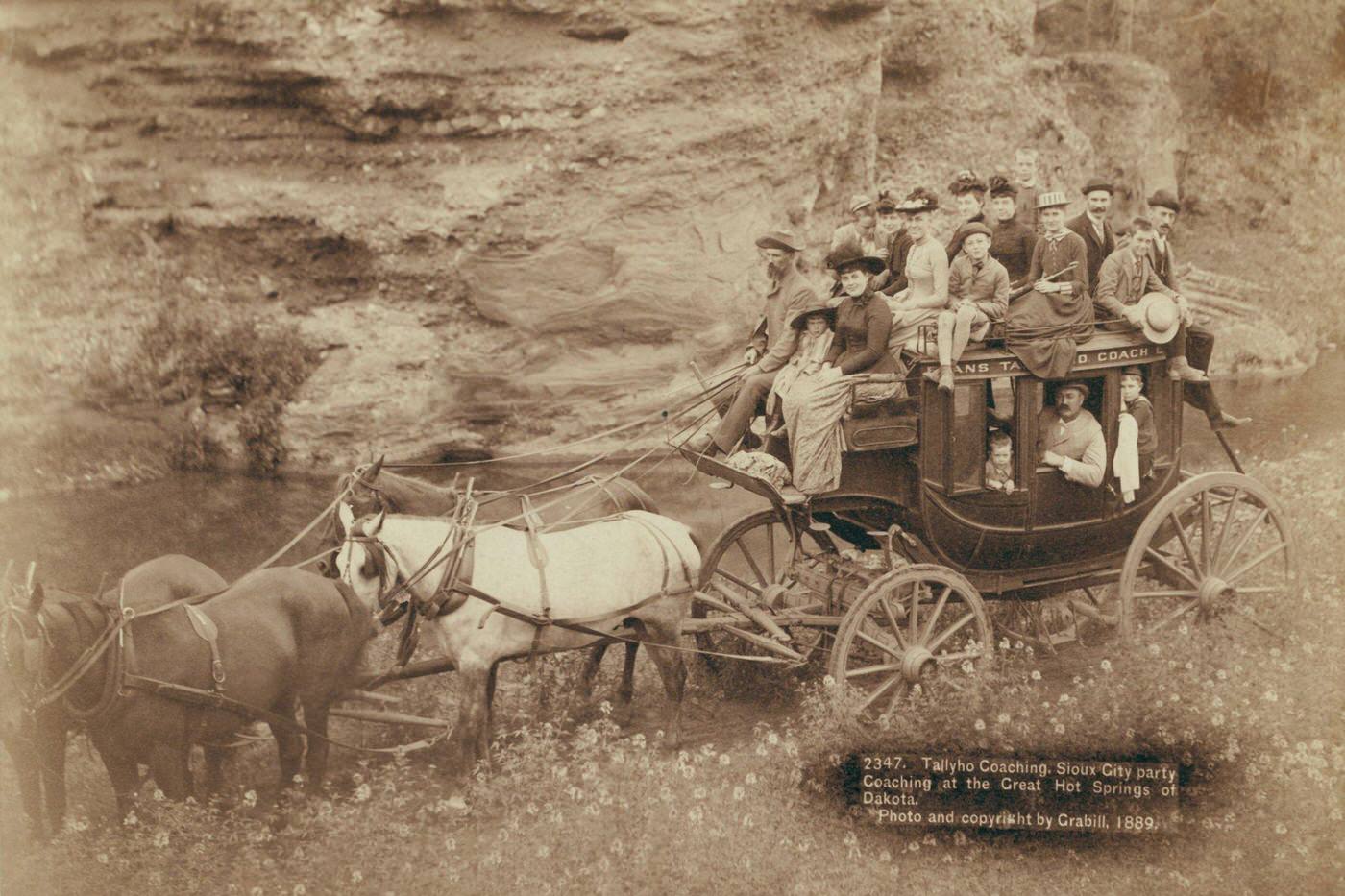 Tallyho Coaching. Sioux City party Coaching at the Great Hot Springs of Dakota, United States, 1890: Horse-drawn stagecoach carrying formally dressed women, children, and men.