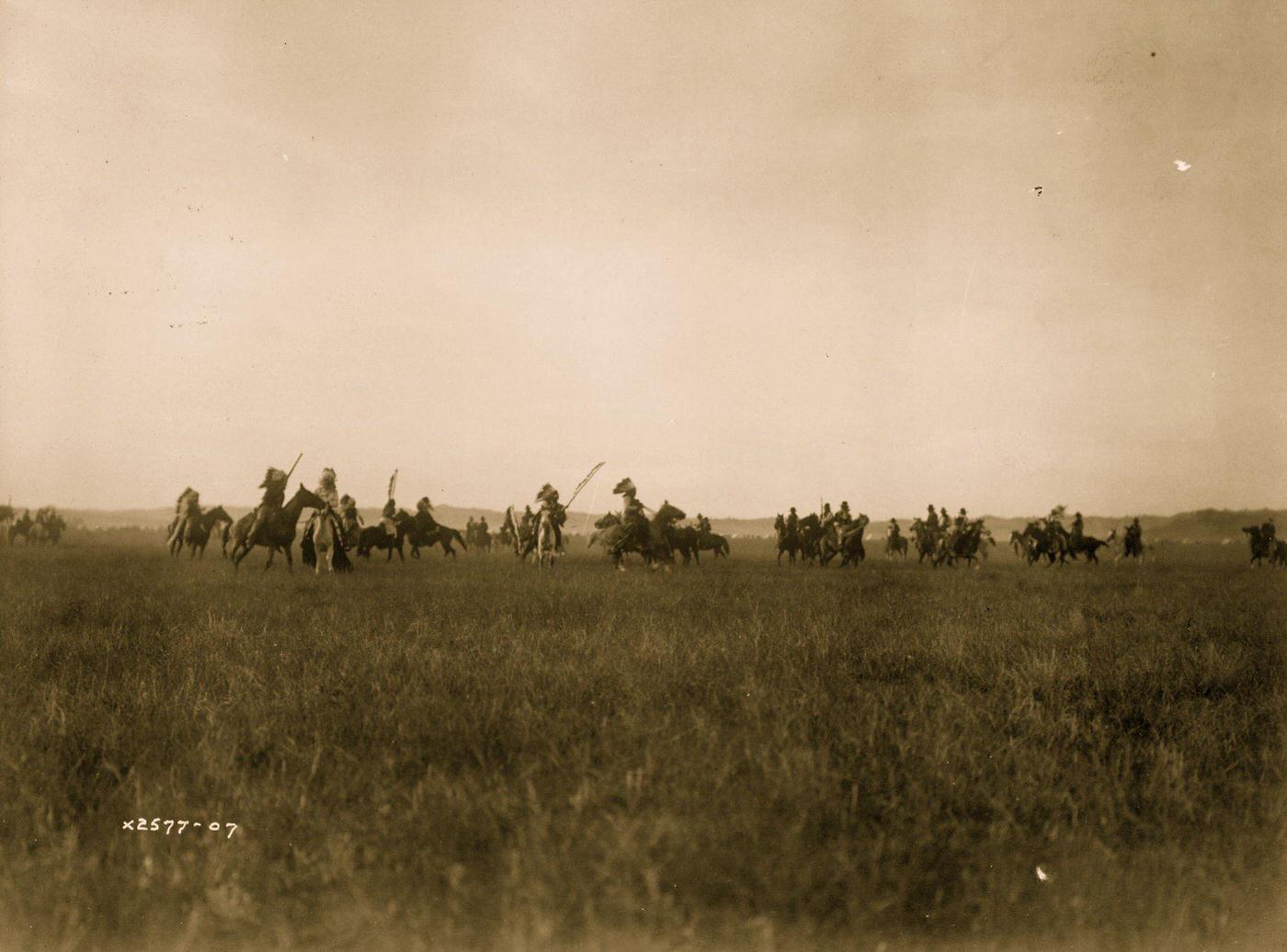 Dakota Indians on horseback on plains, 1907