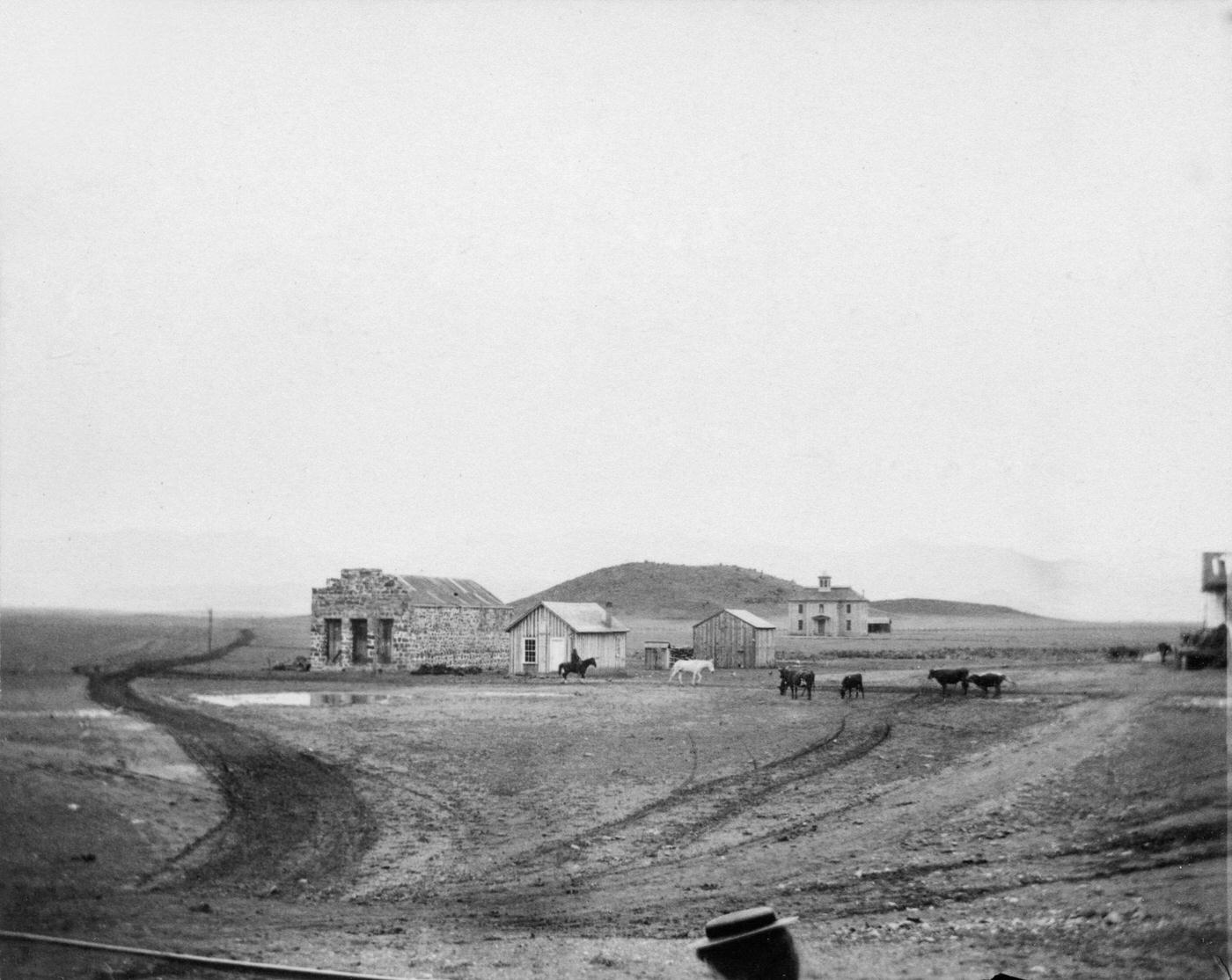 On The Plains, view of a handful of buildings, in a small frontier town on the Plains, during America's westward expansion era, nineteenth century.