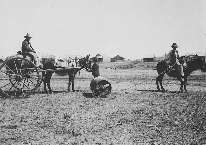 Two traditional methods of hauling water in Old Mexico and the southwestern United States are depicted in this photograph from Texas in 1905.