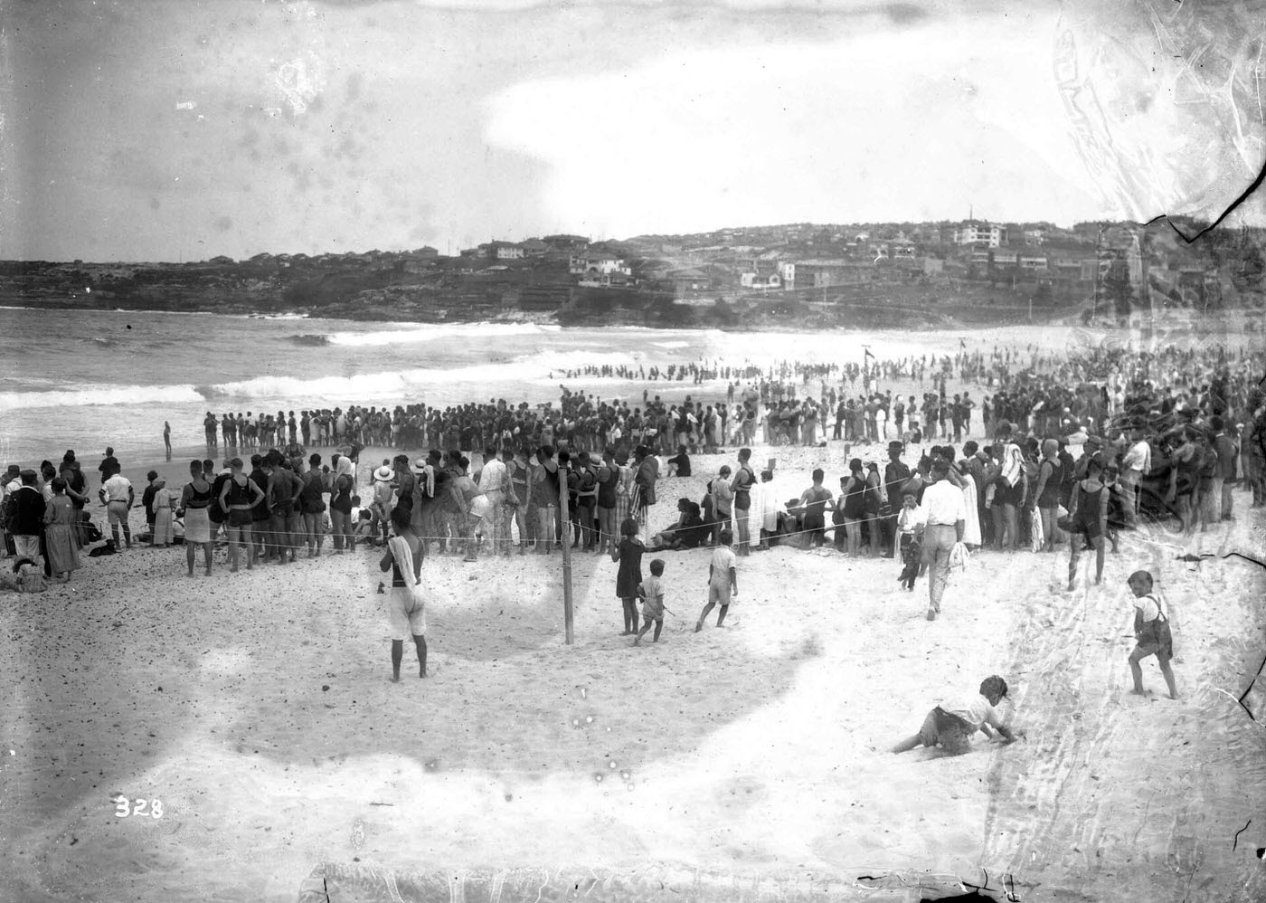 The launch Australia with spectators sailing on the harbour