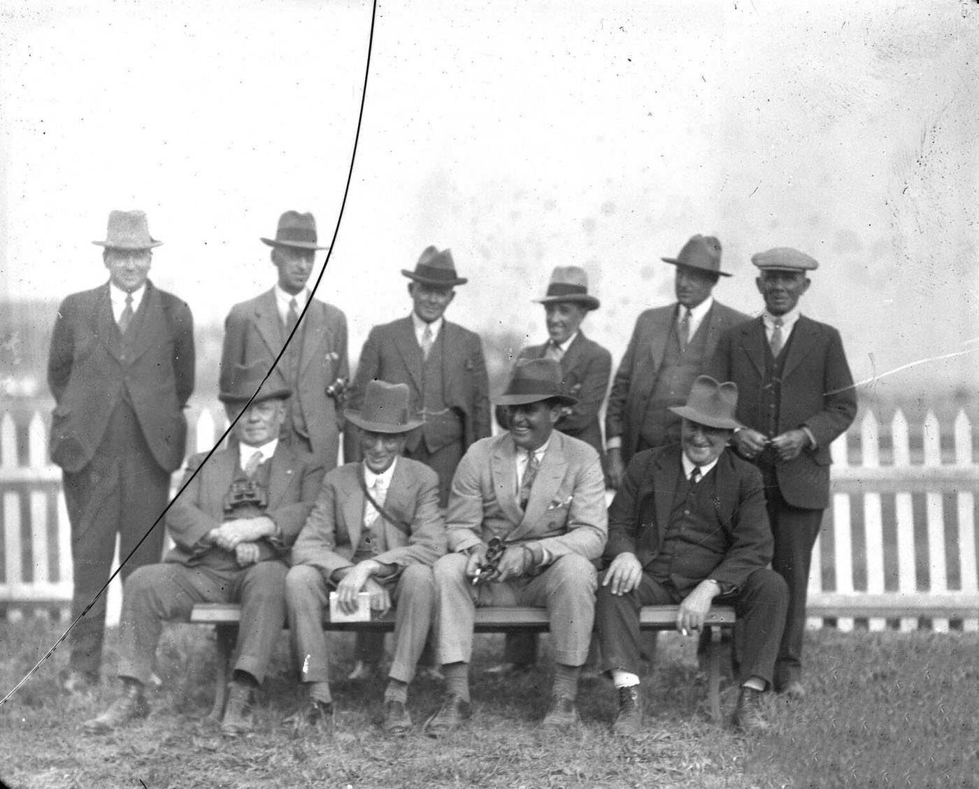Group portrait of spectators waiting for a race