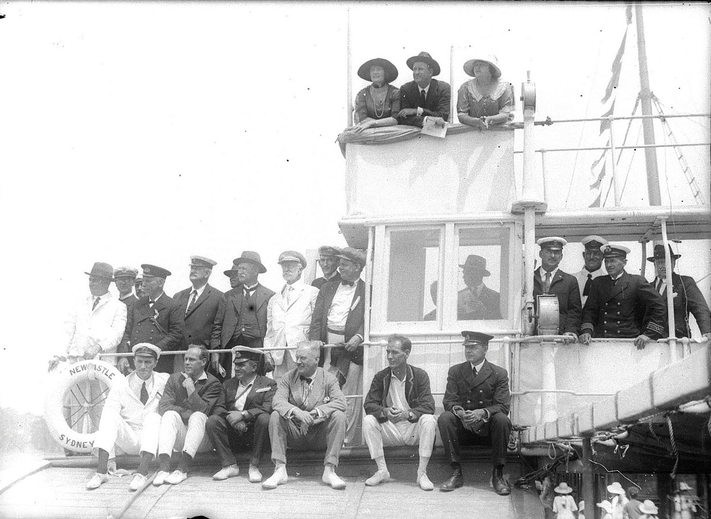 Spectators watching a sailing race aboard the ferry Newcastle