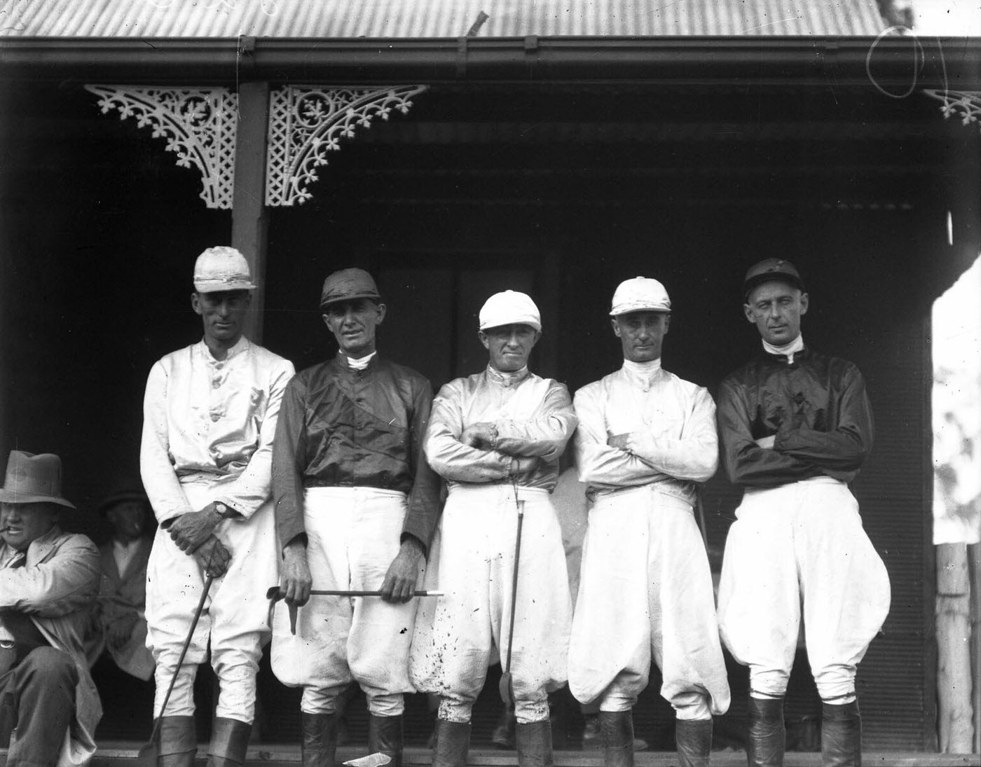 Portrait of jockeys at a clubhouse