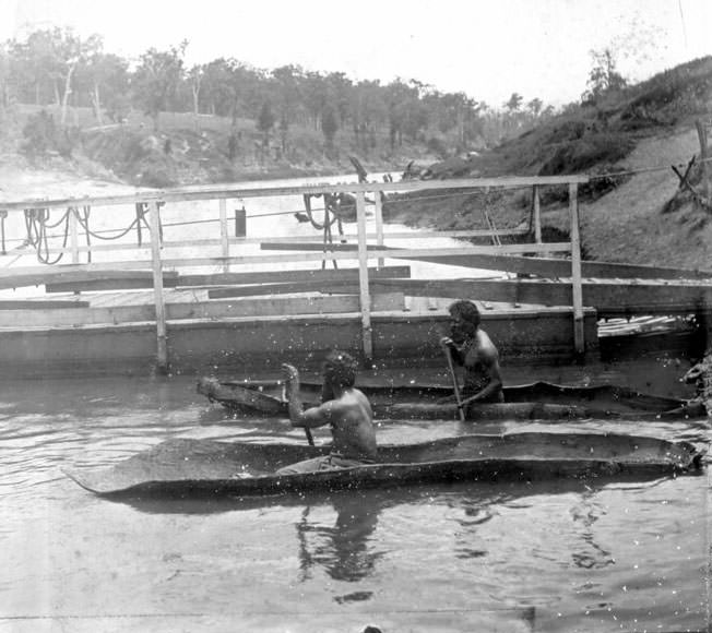 Aboriginal people in bark canoes, location unknown