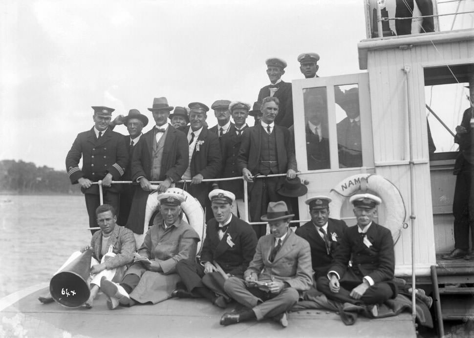 Crew and officials of the Pittwater Regatta on Naomi, Sydney Harbour