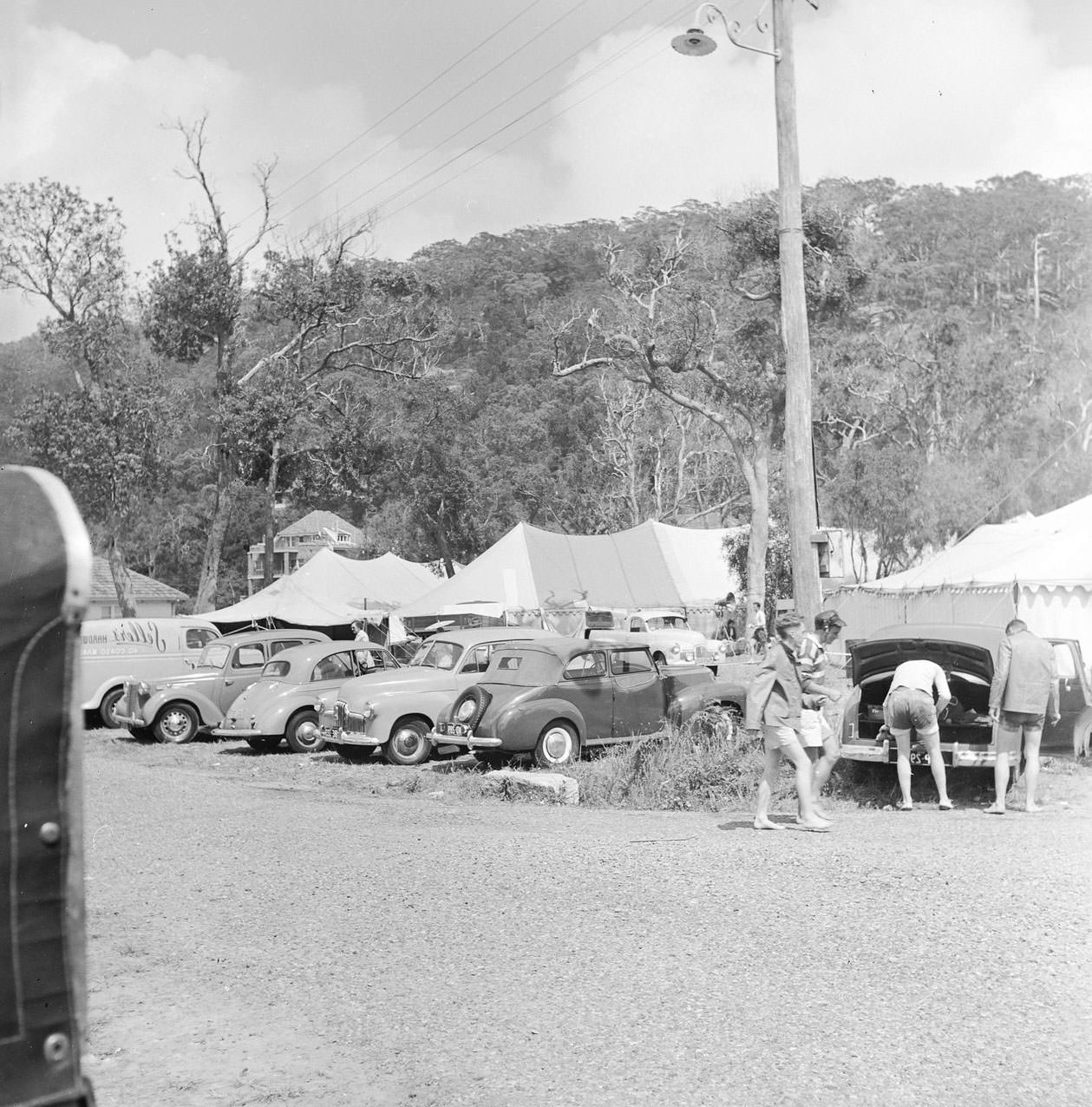 Cars parked at Pittwater for a sailing event