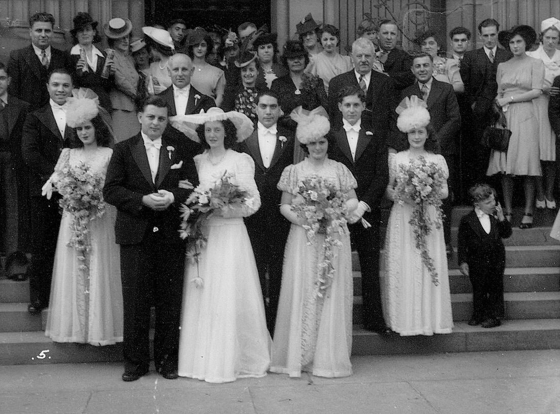 Portrait of a wedding party on the steps of St Marys Cathedral, Sydney