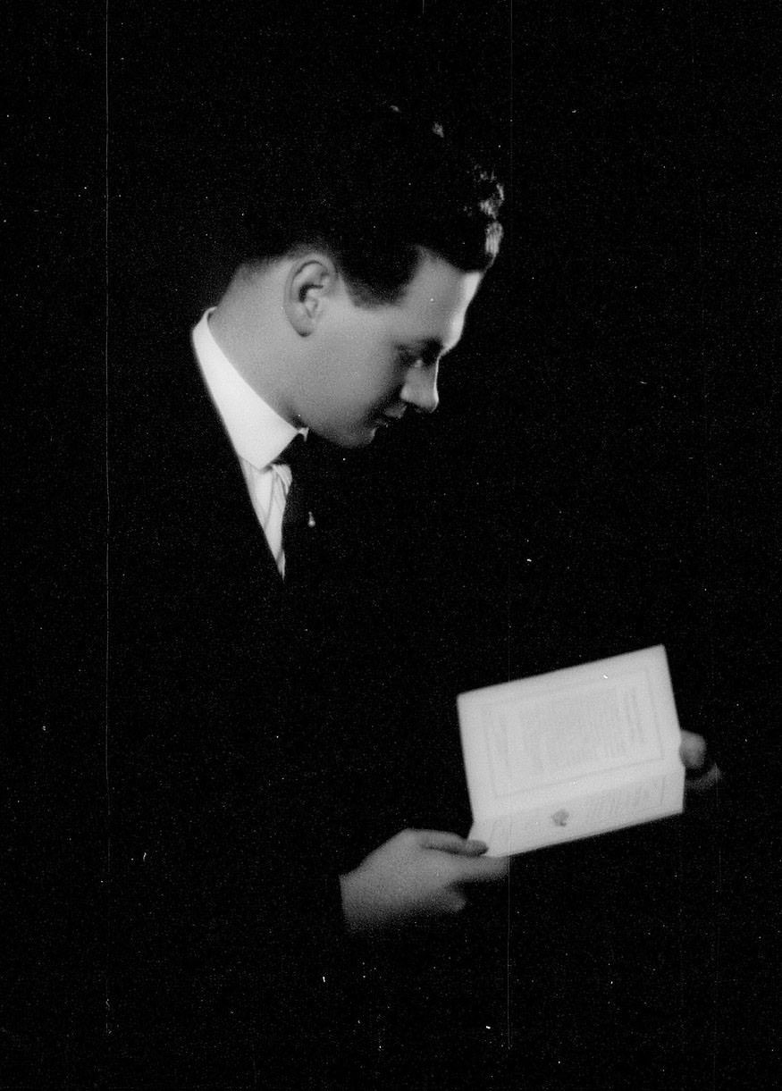 Portrait of a man (possibly of the surname 'Green') reading a book