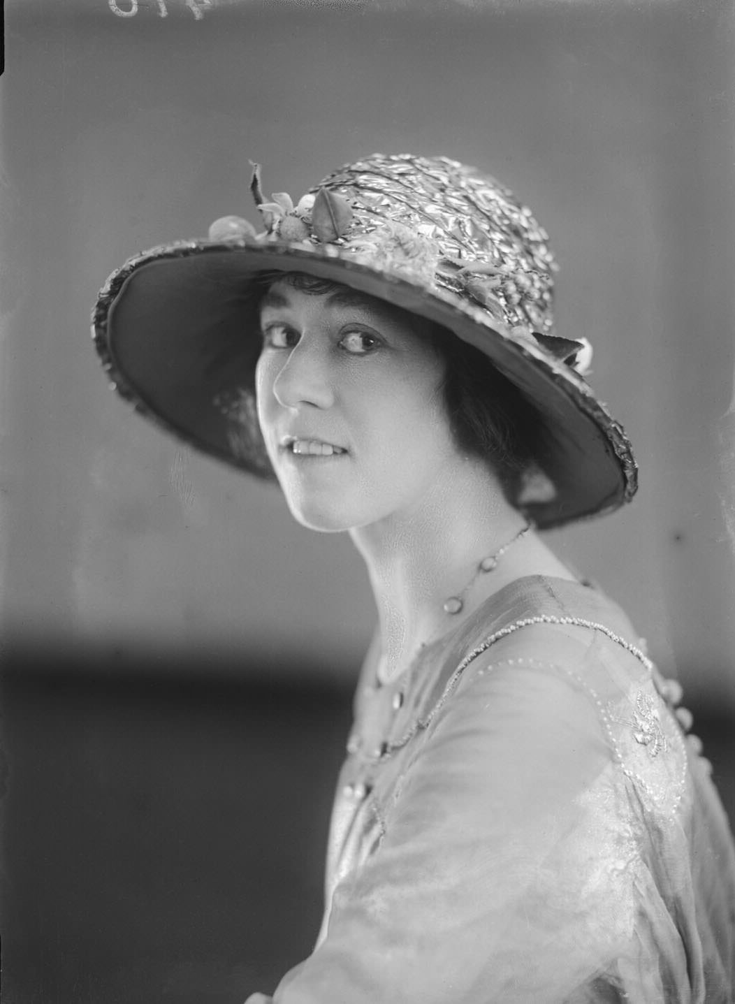 Portrait of an unknown woman in a hat