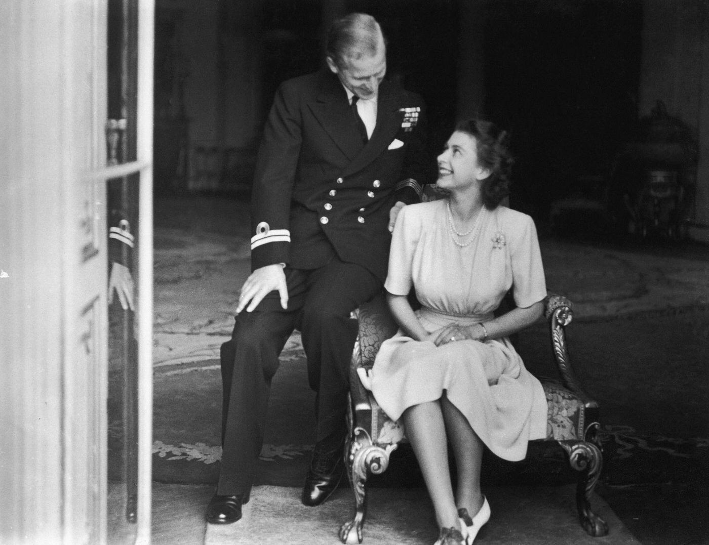 Princess Elizabeth and her fiance, Philip Mountbatten at Buckingham Palace, London, England, 10 July 1947.