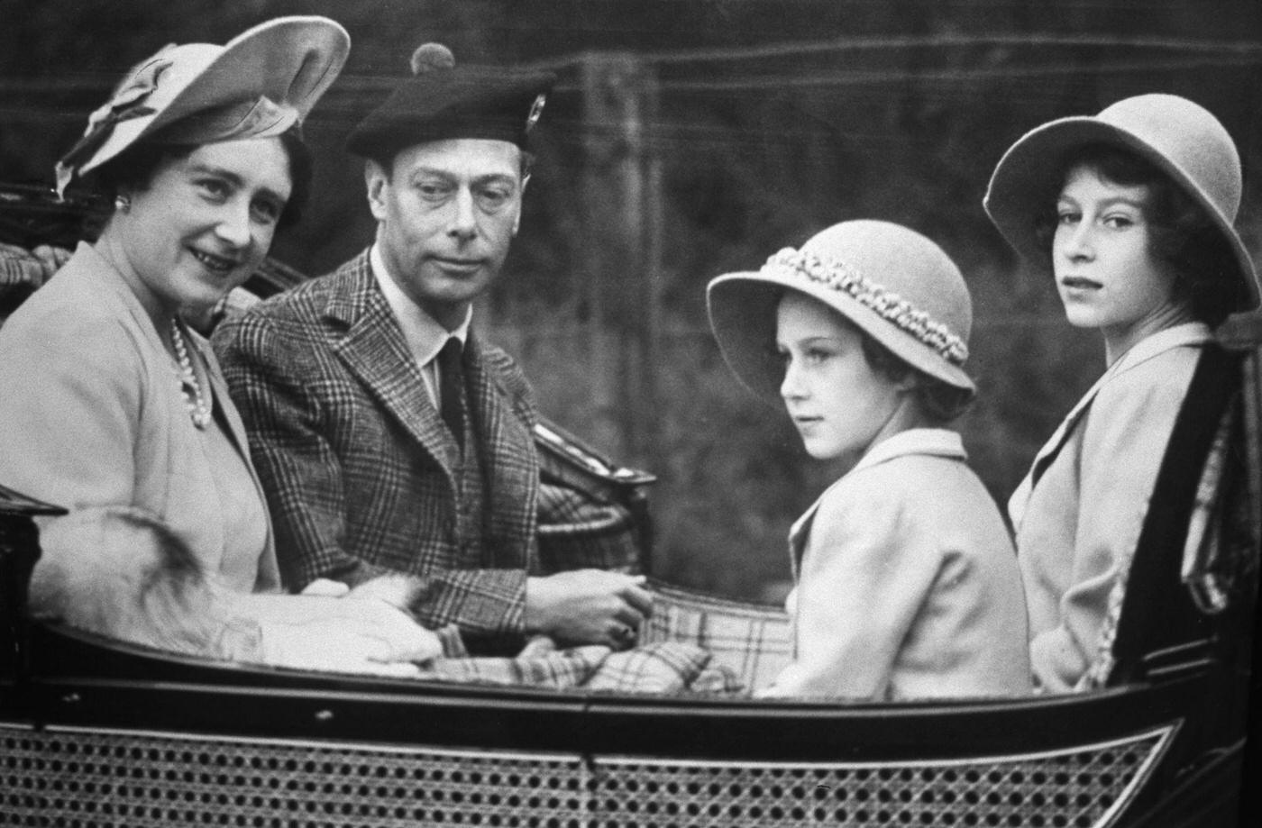 King George VI, the Duchess of York and Princesses Margaret and Elisabeth on their way to attend mass at Crathie Church, 1939.