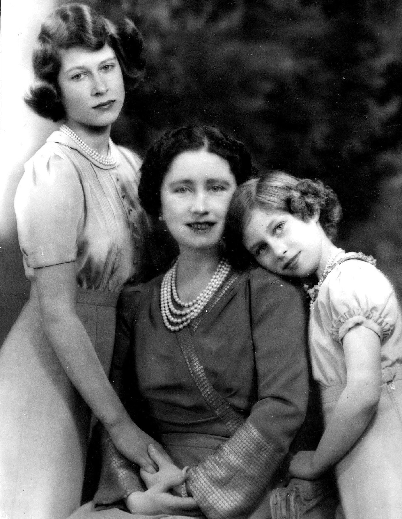 Queen Elizabeth with Princess Elizabeth and Princess Margaret during World War II in 1940.