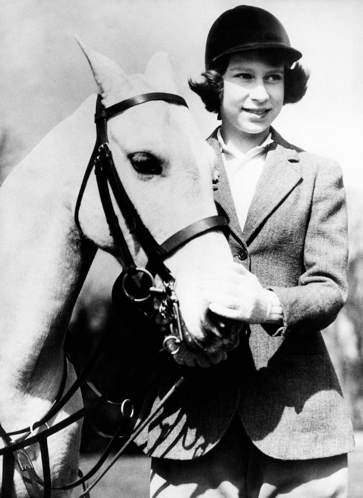 Princess Elizabeth, the future Queen Elizabeth II, in Windsor Great Park with her white pony, 1939.