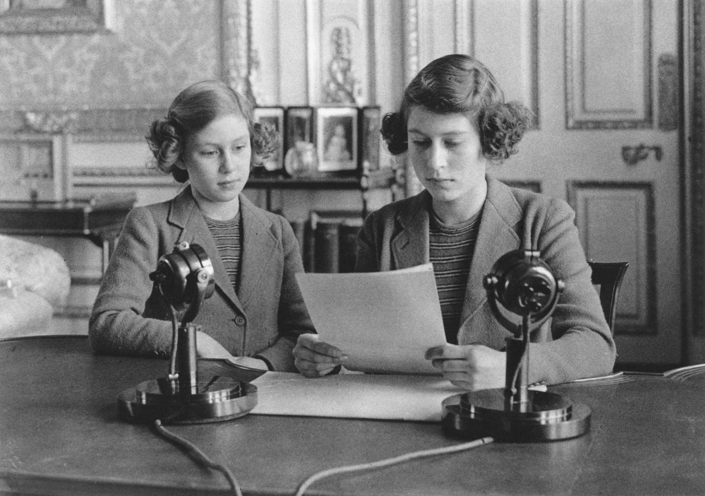 Princesses Elizabeth and Margaret (1930-2002) making a broadcast to the children of the Empire during World War II, 10th October 1940.