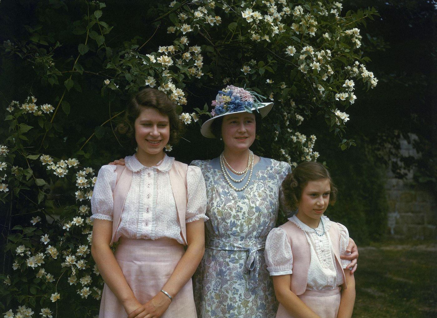 The Queen Mother with Princess Margaret and Princess Elizabeth at Windsor Castle in England on 8 July 1941.