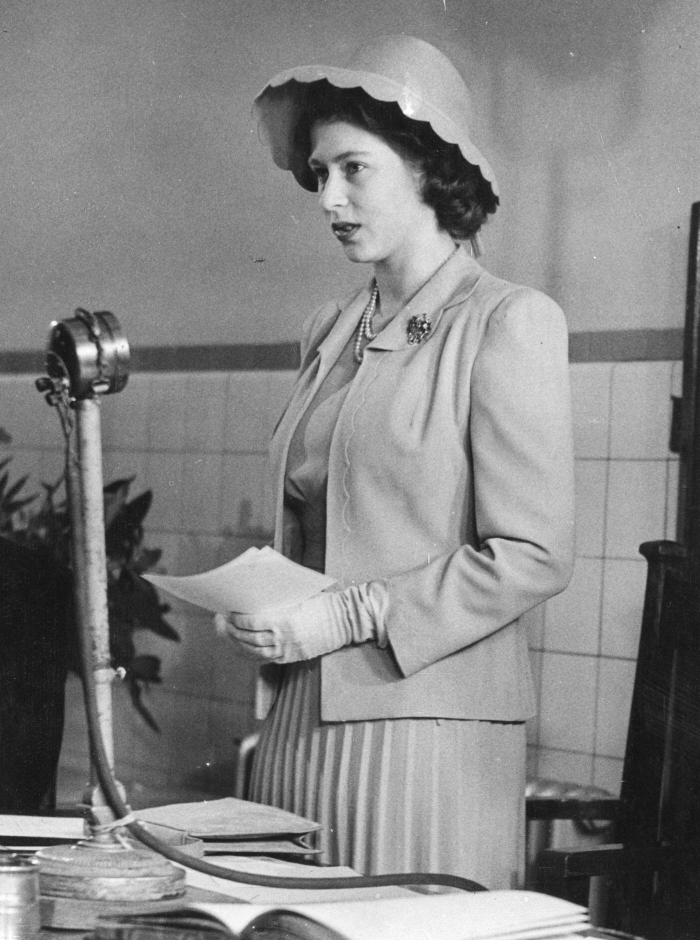 Princess Elizabeth addressing the Governors Court at the Queen Elizabeth Hospital for Children as their President, her first solo engagement, 1944