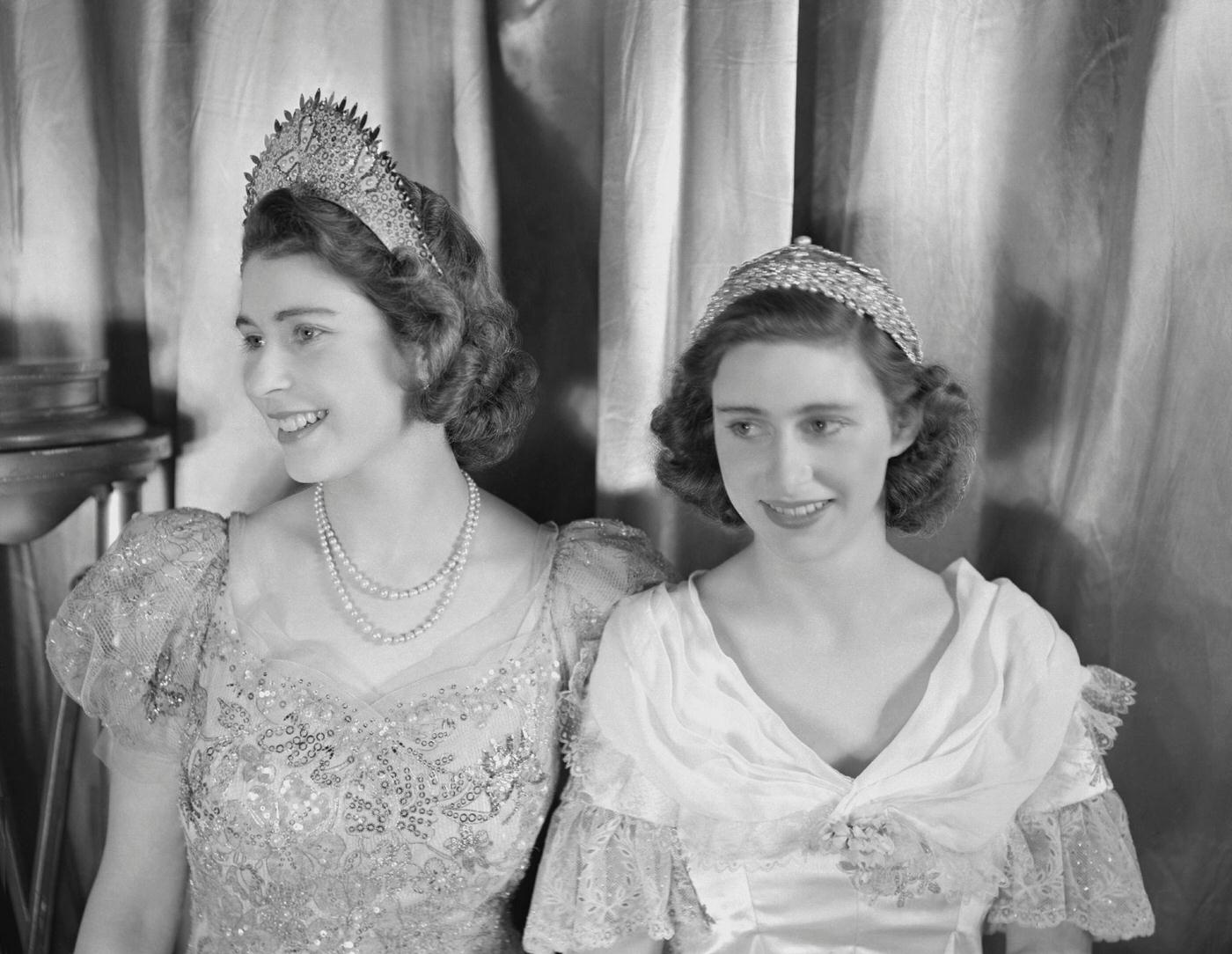 Princess Elizabeth and Princess Margaret in a royal pantomime production of 'Old Mother Red Riding Boots' at Windsor Castle, 1944