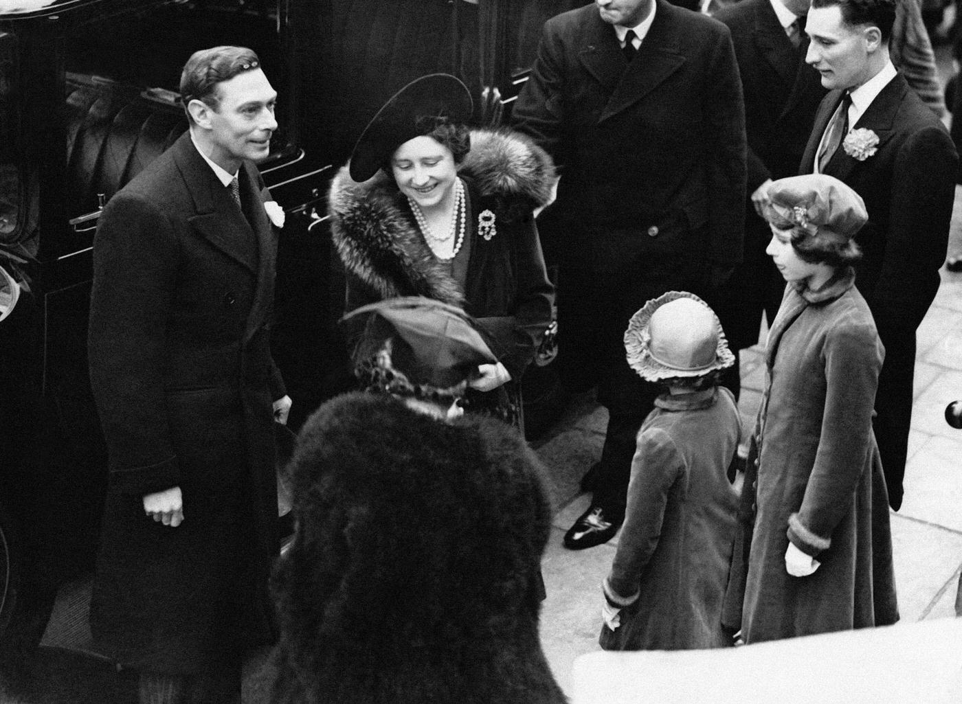 King George VI and Queen Elizabeth arrive at the wedding of Cecilia Bowes-Lyon, a niece of the queen, and Kenneth Harington on March 8th, 1939 in London, UK.