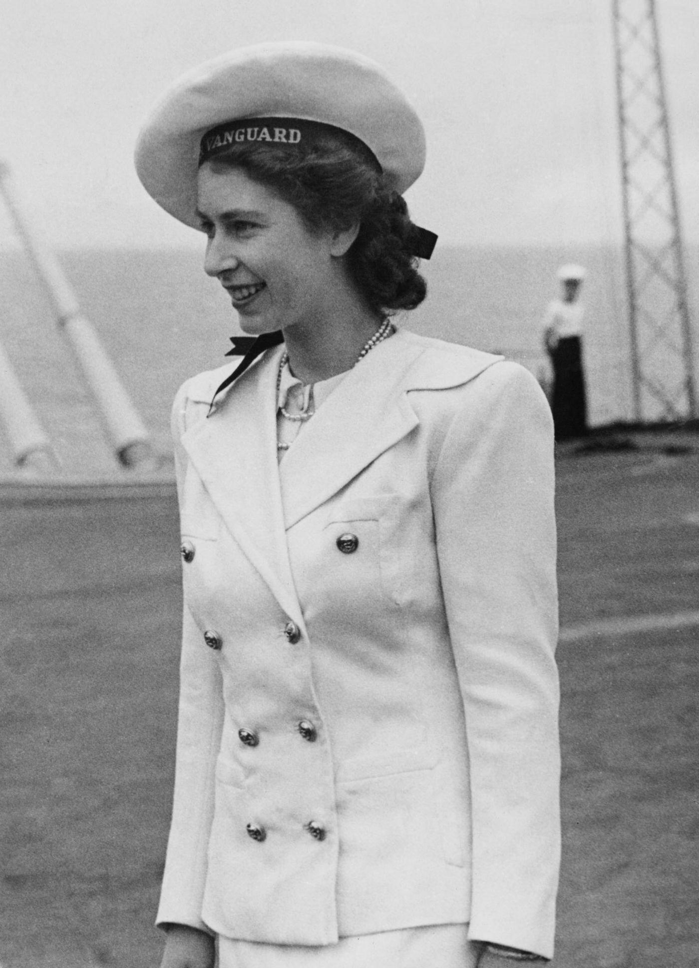 Princess Elizabeth on board the Royal Navy aircraft carrier HMS Implacable during a visit by the royal family from HMS Vanguard, which is taking them to South Africa, 17 February 1947.