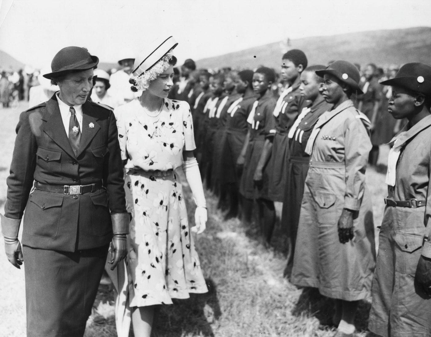 Princess Elizabeth inspects a line of Rhodesian girl guides at Lobatse, Bechuanaland Protectorate, 21 April 1947.
